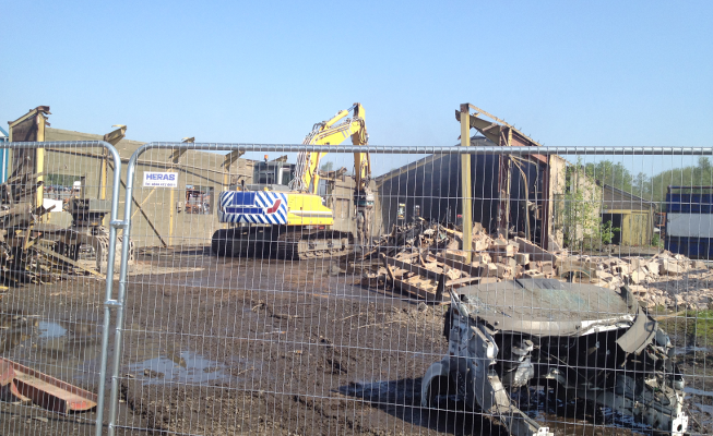Systematic demolition of portal framed building